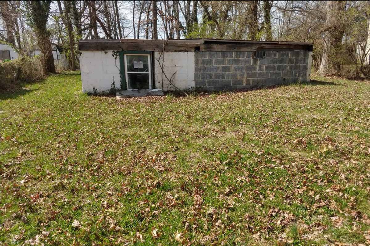 Outdated small shed in Rockville, MD with lots of unused land around it