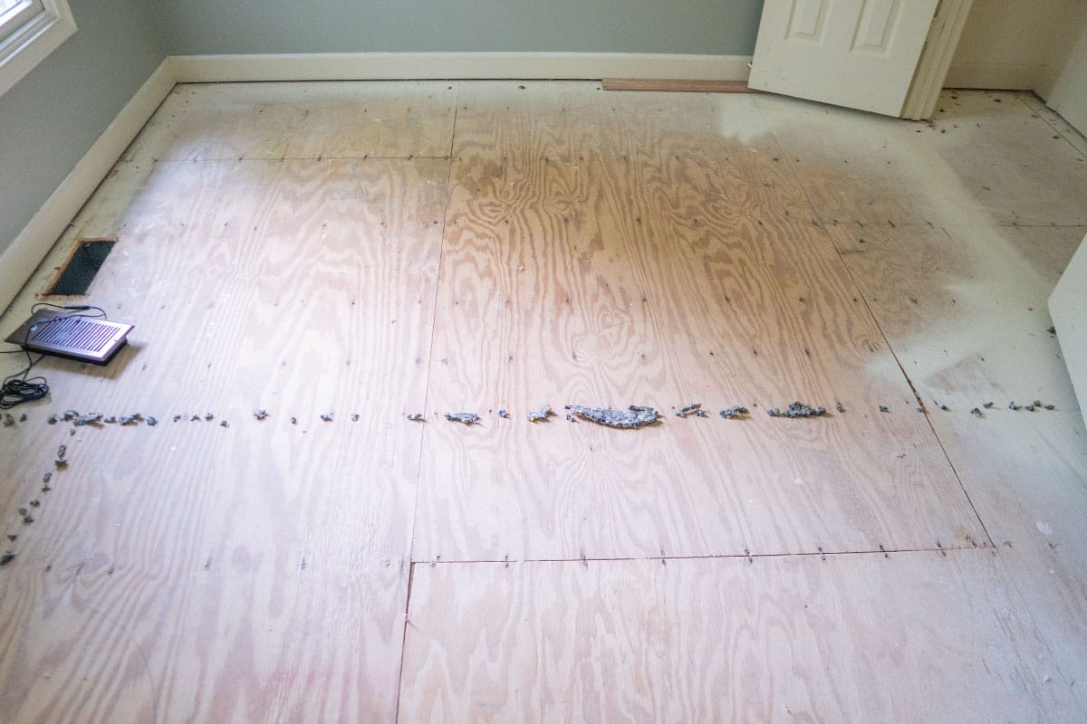 Closeup on flooring of a Derwood home bedroom before being renovated